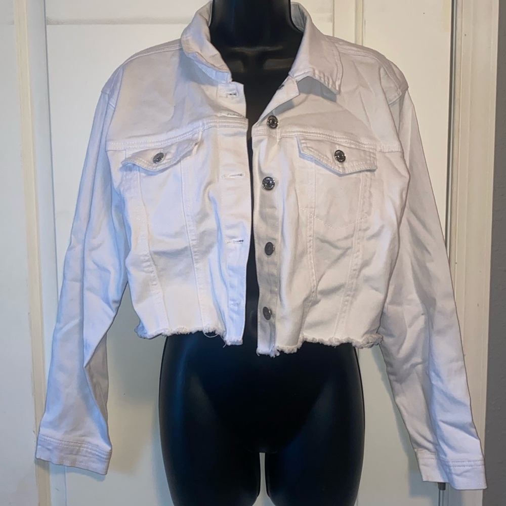 Almost Famous white cropped with distressed bottom Jean jacket.